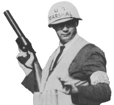 U.S. Marshal Clarence Al Butler with a rifle