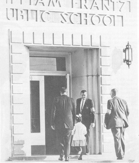 Deputy Marshals escorting Ruby Bridges; a first grader; to school