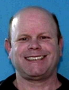 Face photo of male fugitive Bruce Sawhill