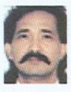 Face photo of male fugitive Delasma Ramirez