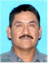 Face photo of male fugitive Dionicio Martinez