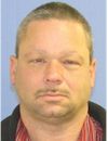 Face photo of male fugitive David Earl Burgert Jr