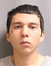 Face photo of male fugitive Rain Concha