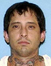 Face photo of male fugitive Antonio Griego