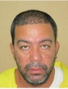 Face photo of male fugitive Luis Alberto Rodriguez