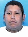 Face photo of male fugitive Raul Zamora-Marcial