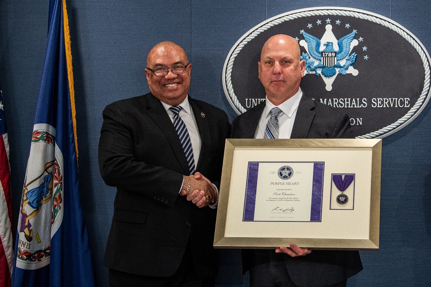 U.S. Marshals Service Task Force Officer, Scott Chambers and Director Ronald Davis