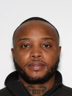 Face photo of male fugitive Scooter Man Jackson