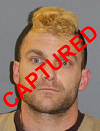 Face photo of the captured fugitive Jesse Daniel Davis