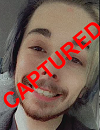 Face photo of the capture fugitive Ethan Mitchell Strong