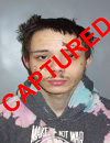 Face photo of the capture fugitive Hakeem Harris