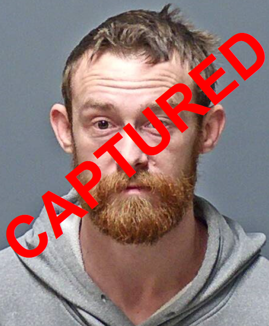 Fugitive Justin Dean Hayes with Captured watermark