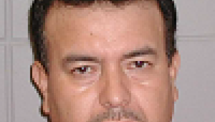 Face photo of male fugitive Jose A Barboza