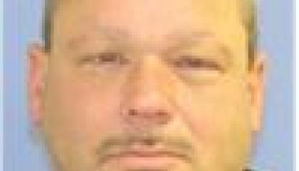 Face photo of male fugitive David Earl Burgert Jr