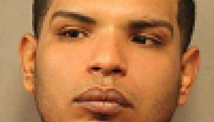 Face photo of male fugitive Jose Martinez Rolon