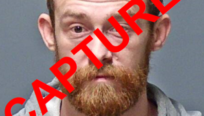 Fugitive Justin Dean Hayes with Captured watermark
