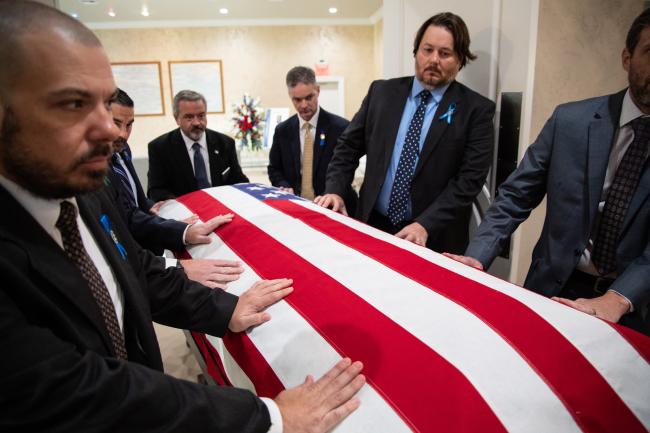 Mourners walk with casket of fallen deputy Jared Keyworth