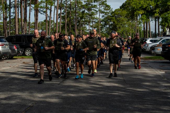 Deputy U.S. Marshals running