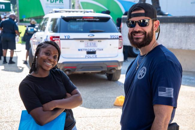 Deputy U.S. Marshal with child participating at the 2022…