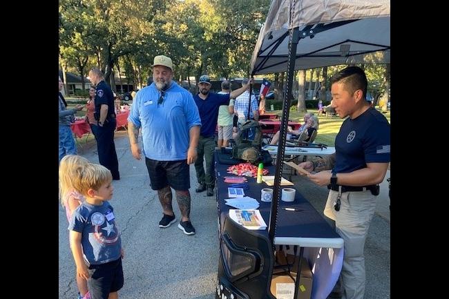 Deputy U.S. Marshals speaking to children at 2022 National…