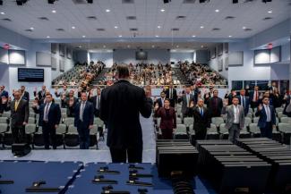 Deputy Director Tyler swearing in new Deputy U.S. Marshals.